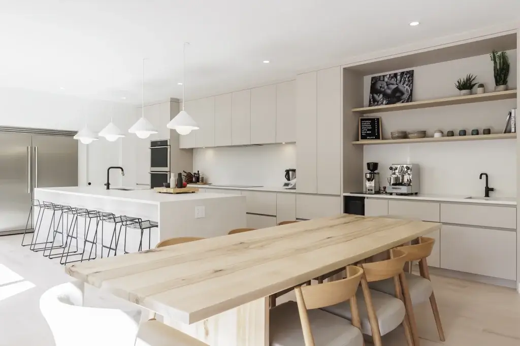 View of kitchen with wooden table and chairs